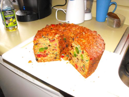 After five hours of baking and three hours of cooling, it's ready to be cut into portions. As you can see, there is only enough "cake" to hold the fruit together.